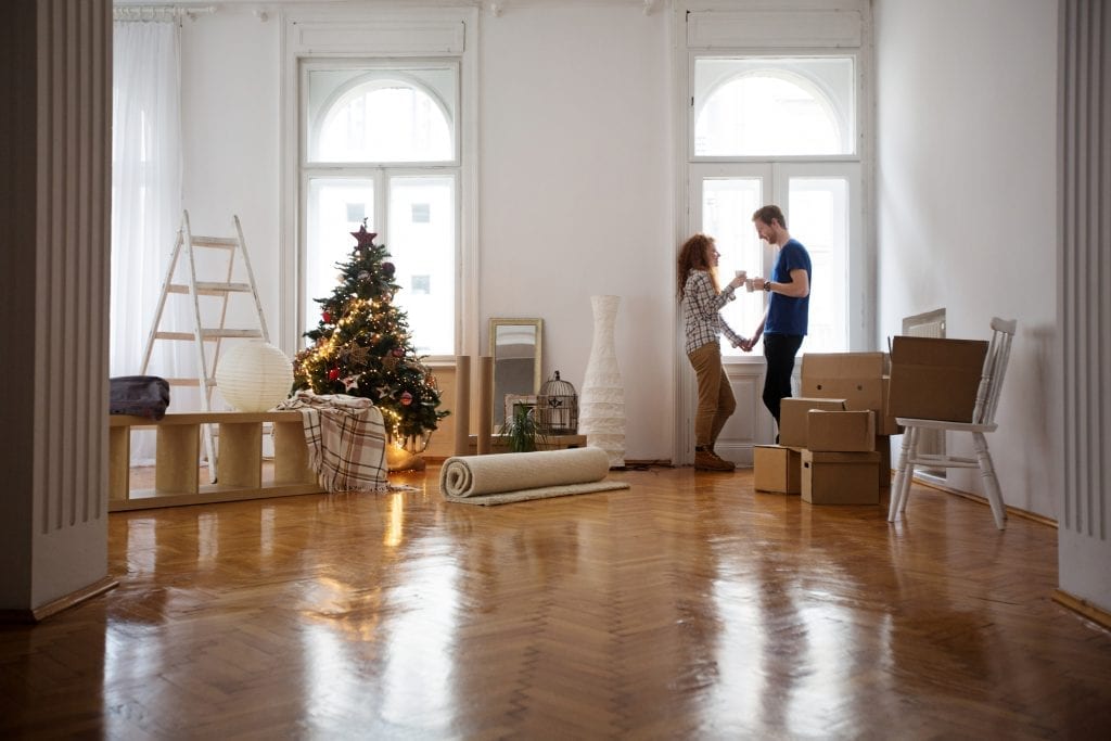 Young Couple Moving in at Christmas