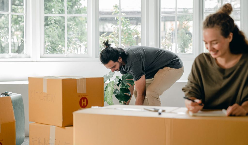 Packing Tips for Moving People packing boxes for moving because of moving tips